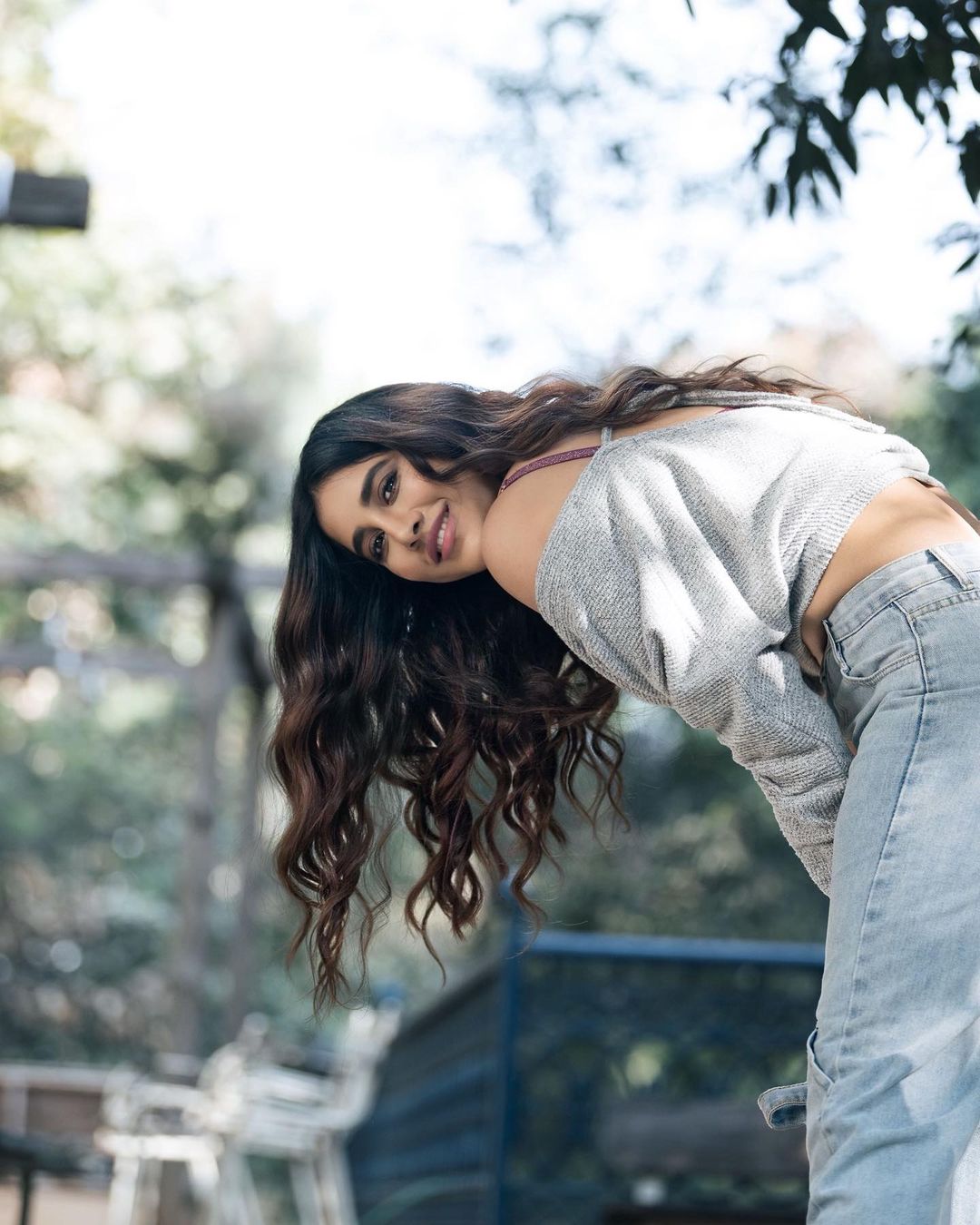 Nabha Natesh flaunting herself in a floral frock and a basic jeans with sweat shirt