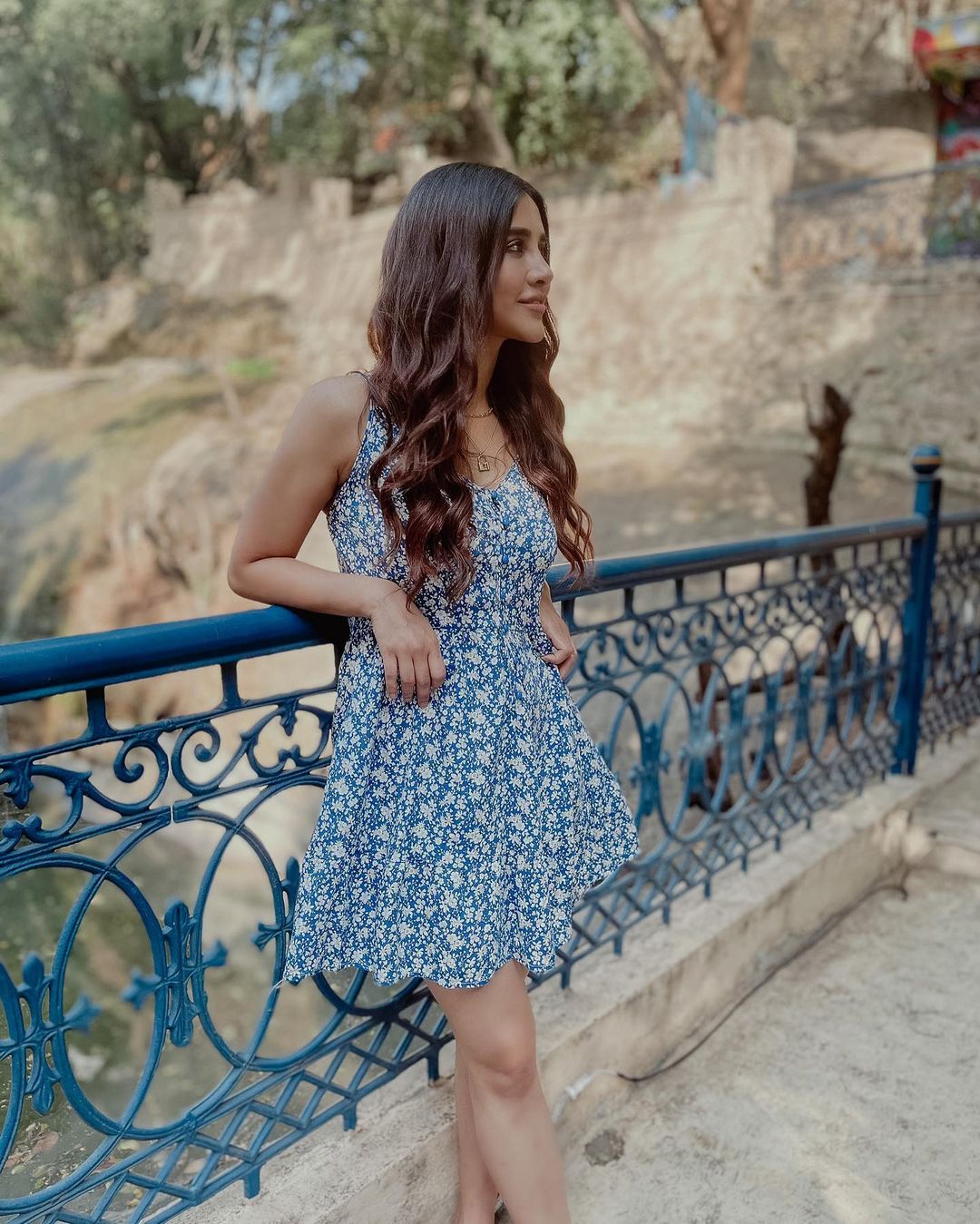 Nabha Natesh flaunting herself in a floral frock and a basic jeans with sweat shirt