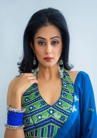 Priyamani looks perfect in a blue green lehenga