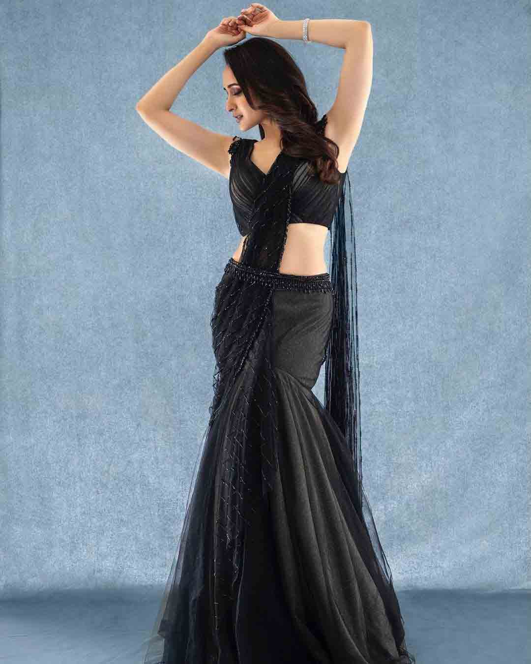 Pragya Jaiswal looks stunning in a black saree.