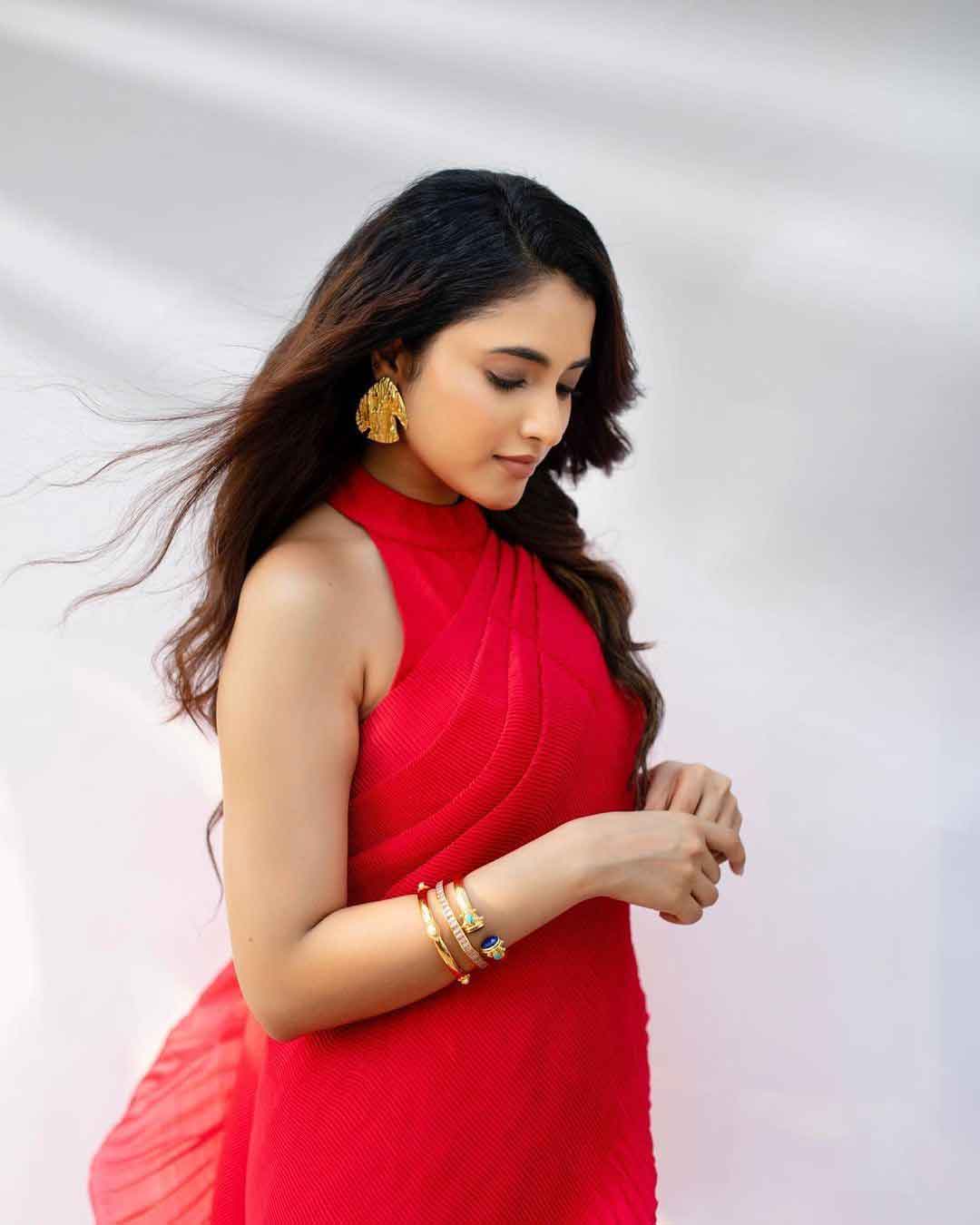 Priyanka Mohan Looks Fabulous in This Red Saree and Statement Earrings