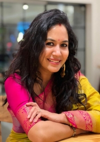 Singer Sunitha Gives a Bright Smile as She Poses for Some Pictures in Her Gorgeous Silk Saree