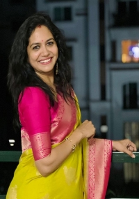 Singer Sunitha Gives a Bright Smile as She Poses for Some Pictures in Her Gorgeous Silk Saree