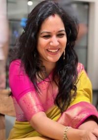 Singer Sunitha Gives a Bright Smile as She Poses for Some Pictures in Her Gorgeous Silk Saree