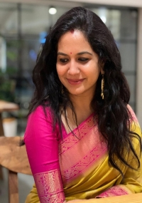 Singer Sunitha Gives a Bright Smile as She Poses for Some Pictures in Her Gorgeous Silk Saree