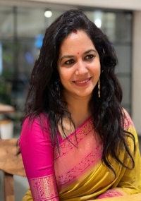 Singer Sunitha Gives a Bright Smile as She Poses for Some Pictures in Her Gorgeous Silk Saree