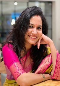 Singer Sunitha Gives a Bright Smile as She Poses for Some Pictures in Her Gorgeous Silk Saree